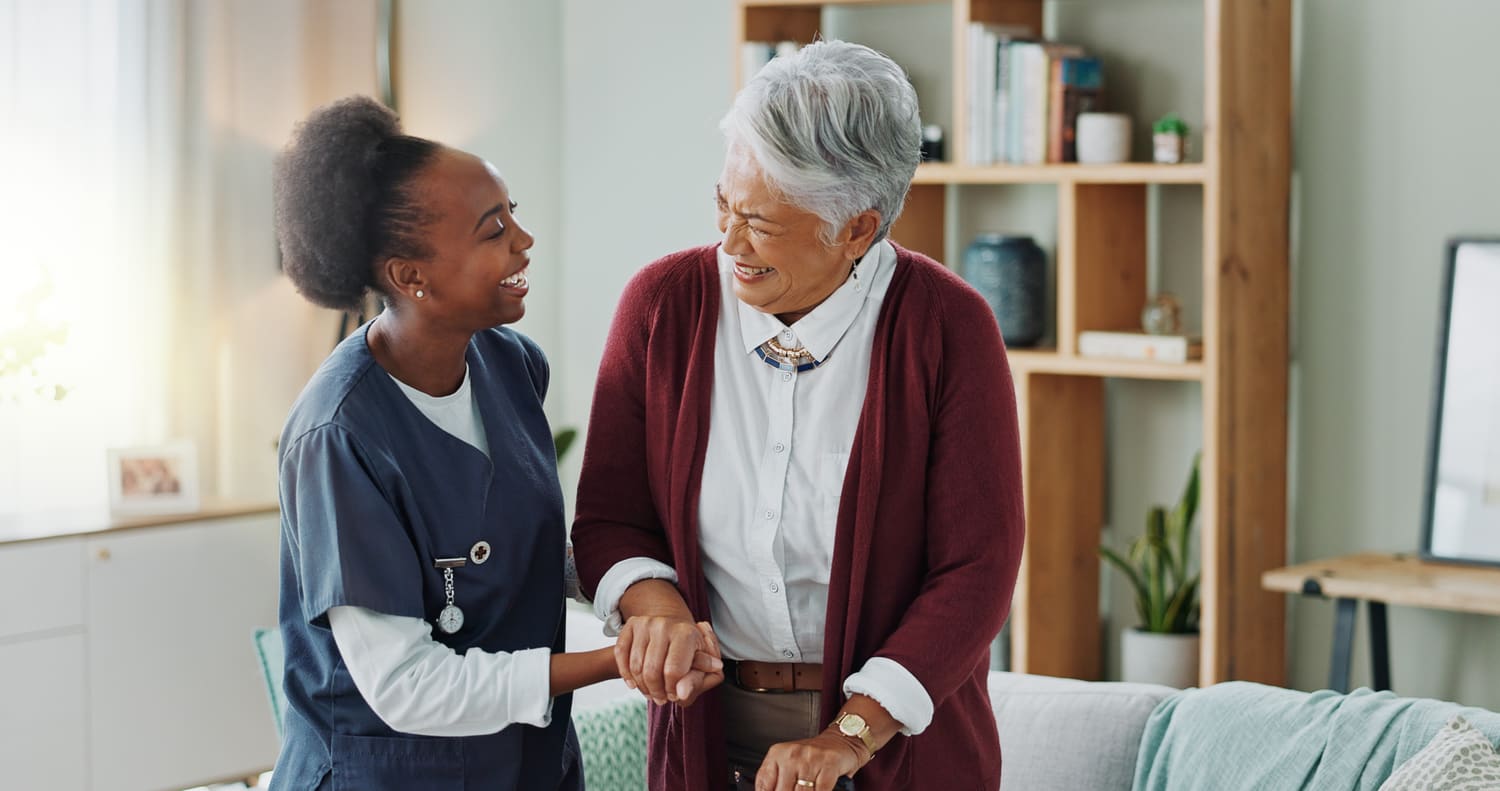 A nurse assisting a resident